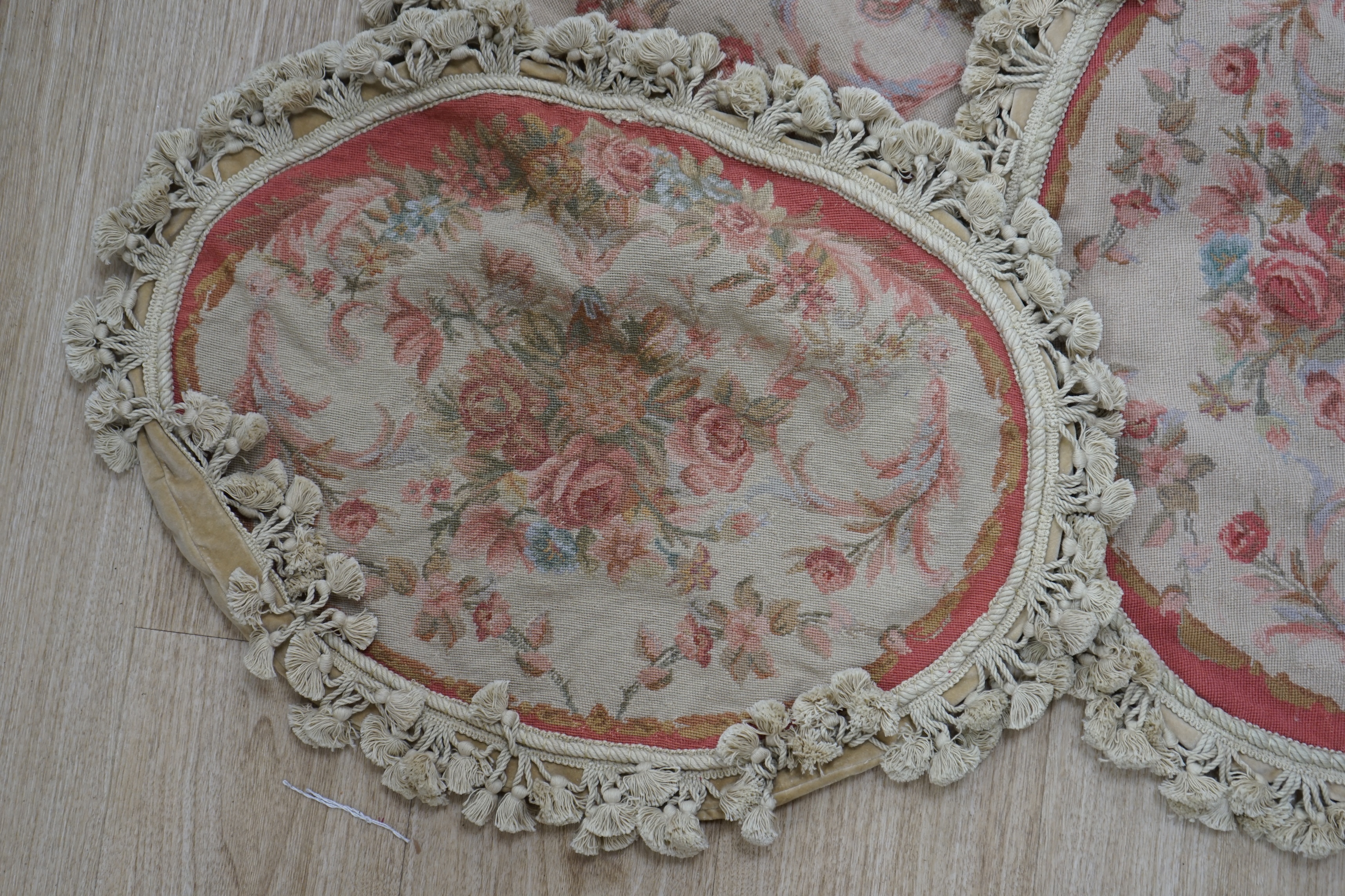 Four small fruit design woolwork cushion covers. Condition - fair, wear and fading commensurate with age